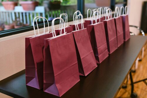 A table of goodie bags at an event