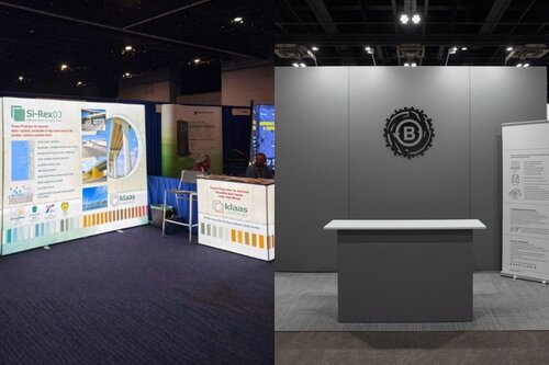 Two different trade show displays contrasted next to each other. Klaas Coatings' backlit display and counter in the left booth. A flat grey display with a counter in the right booth.