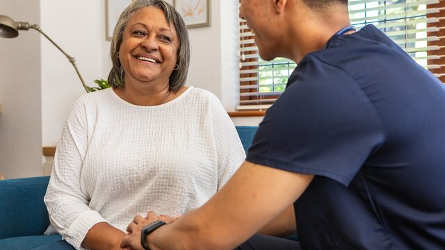 A Helper gently supports an older adult at home. Herewith connects families with reliable Helpers for safe, everyday in-home care.
