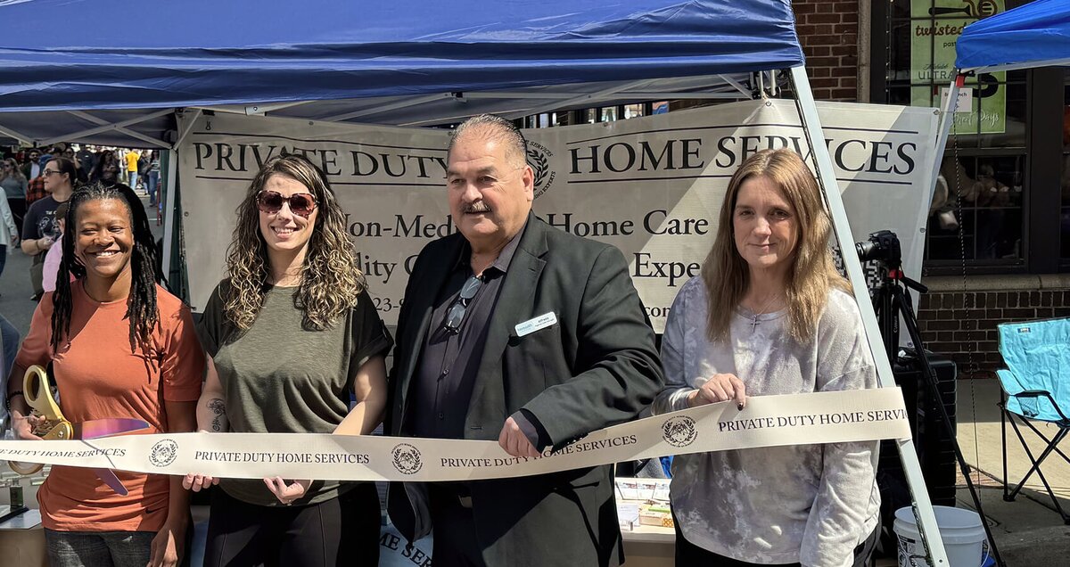 The Private Duty Home Services team celebrates together at a community event, reflecting their commitment to delivering compassionate in-home care in Eastern Tennessee.