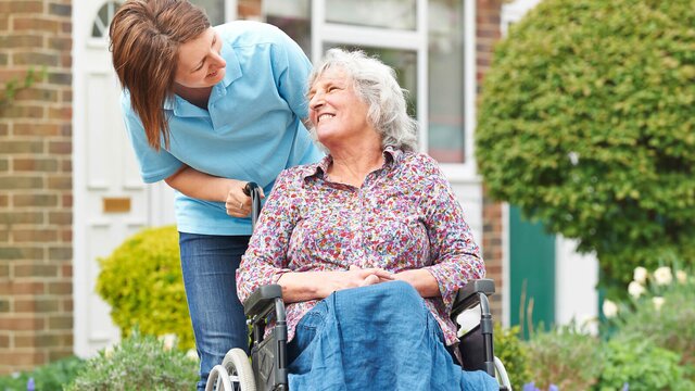 A Helper gently supports an older adult at home. Herewith connects families with reliable Helpers for safe, everyday in-home care.