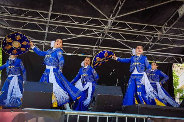 Cultural dancers in blue at Cinco de Mayo