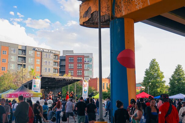 People at Sun Valley Night Market with DROP tent and stage