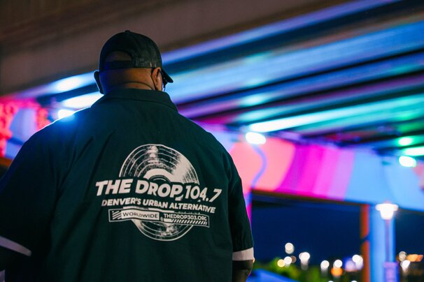 SugaBear wearing the DROP 104.7 w/ pink and blue lights