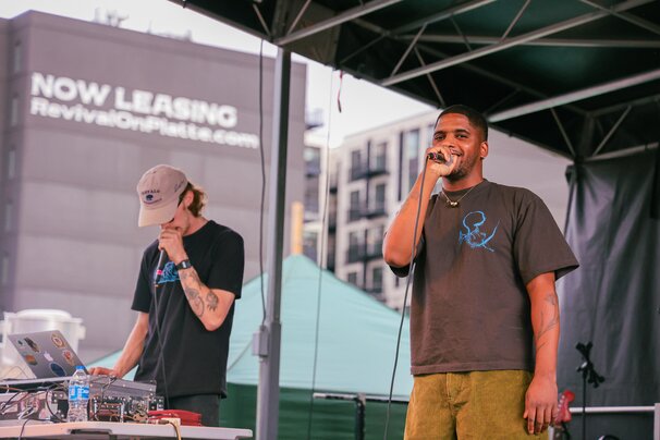Nelo and SIAH RAIN'n performing at Sun Valley Night Market