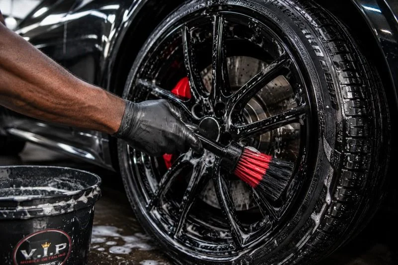 V.I.P Black Out premium tire dressing bottle with a deep black glossy tire finish