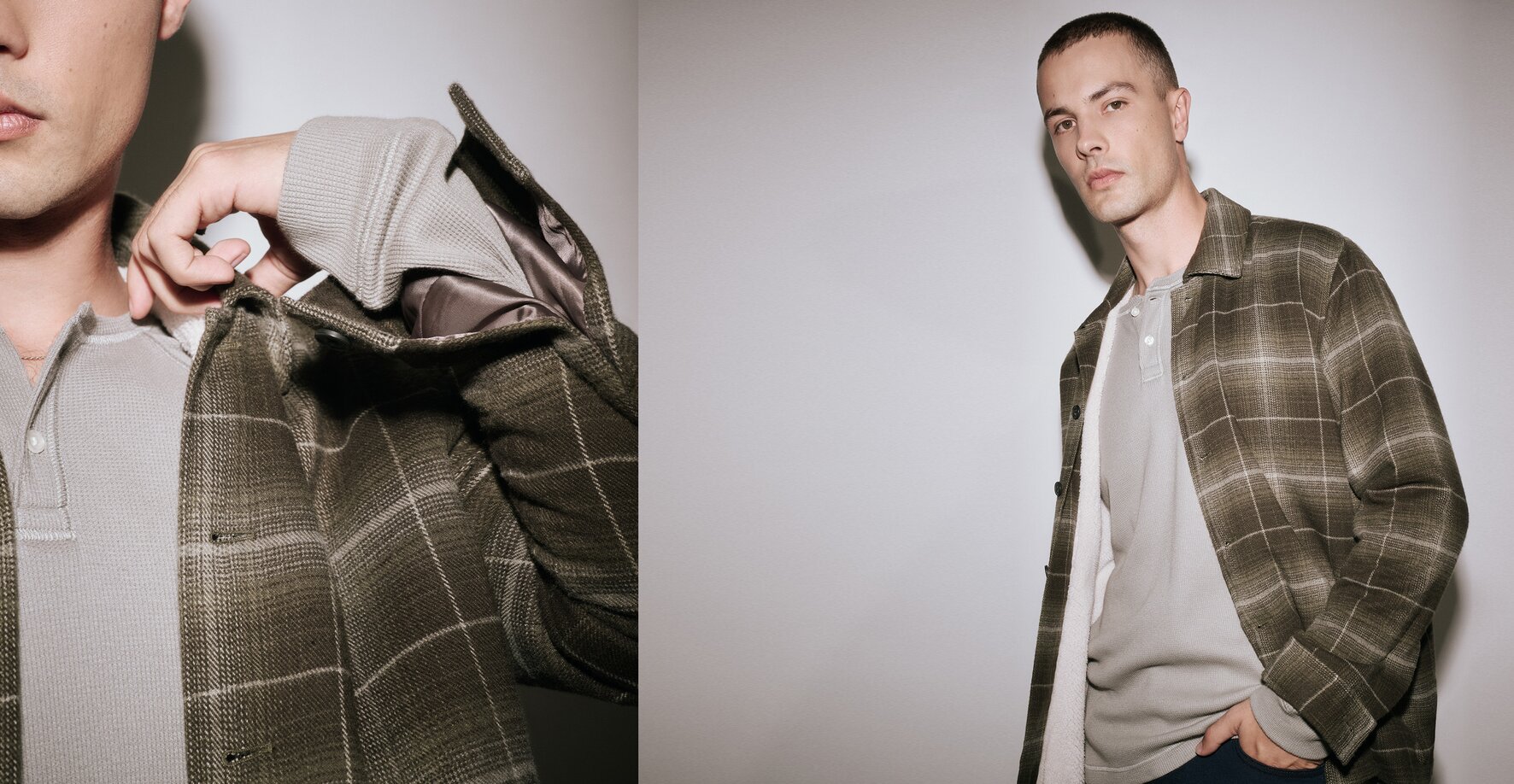 Man wearing a green plaid jacket over a light grey henley and dark wash jeans