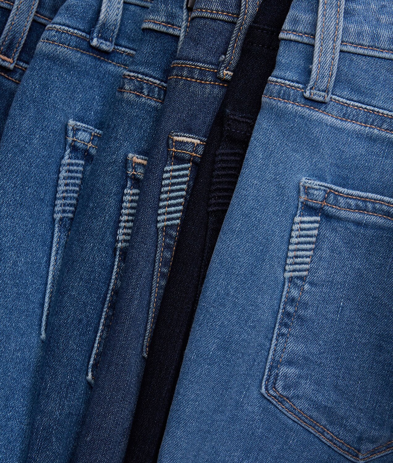 Stack of denim in a range of washes