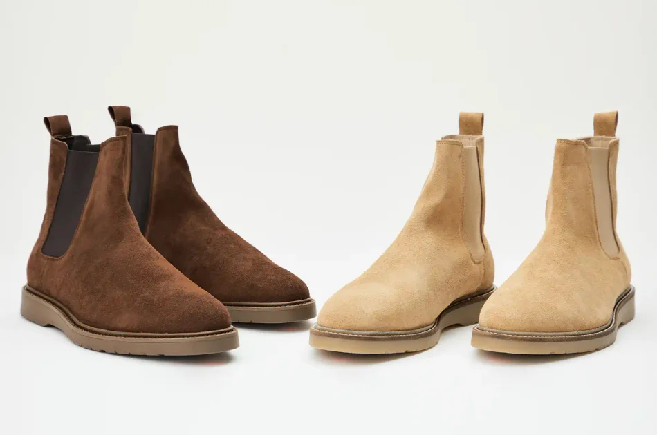 Two pairs of suede Chelsea boots in dark brown and tan