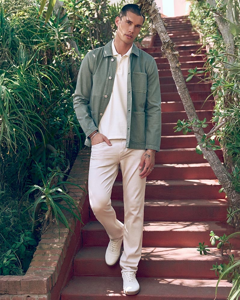 Man wearing a light brown textured short sleeve button up shirt