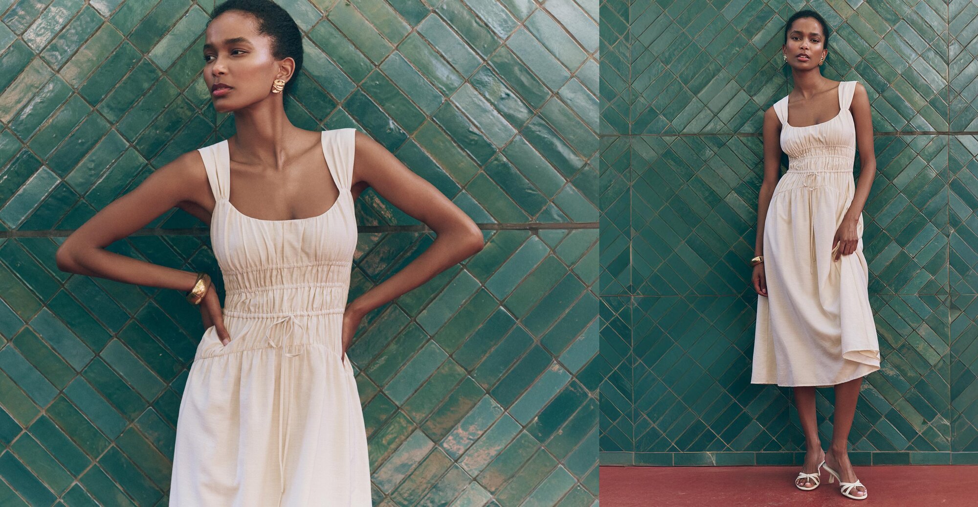 Woman wearing an oyster white flowy midi dress and ivory heeled sandals