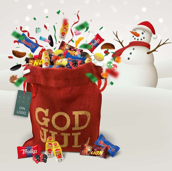 Julegodteri – rød gavepose med GOD JUL fylt med sjokolade og smågodt, illustrert med snømann og vinterstemning