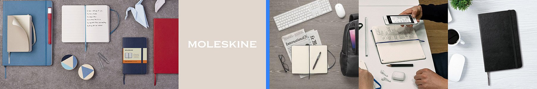 Bredt banner med ulike Moleskine-notatbøker i forskjellige farger, penner og mobiltilbehør, lagt utover flere arbeidsflater.