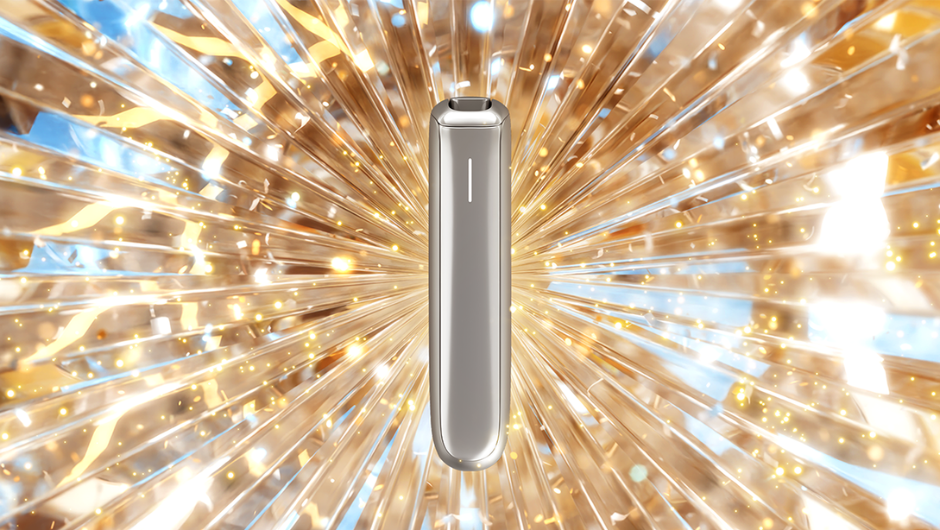 The elegant Ploom Lunar Silver device is centered against a dynamic background with rays of golden light.