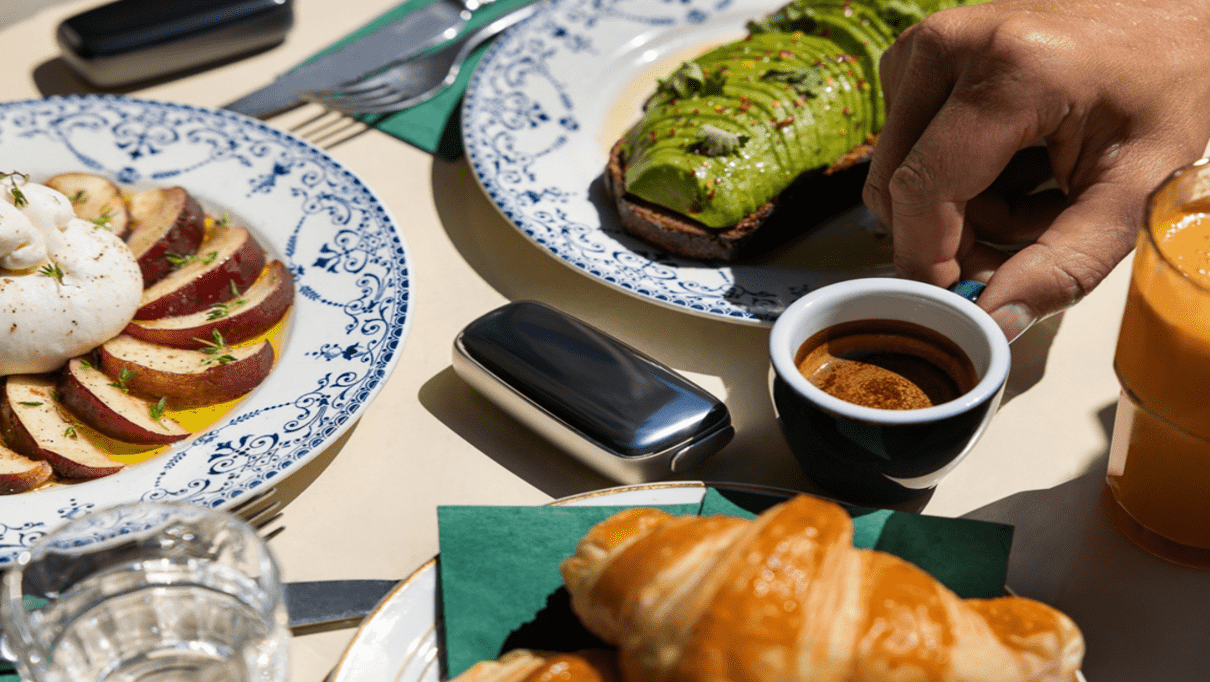 Sunny breakfast with coffee and Ploom X Advanced