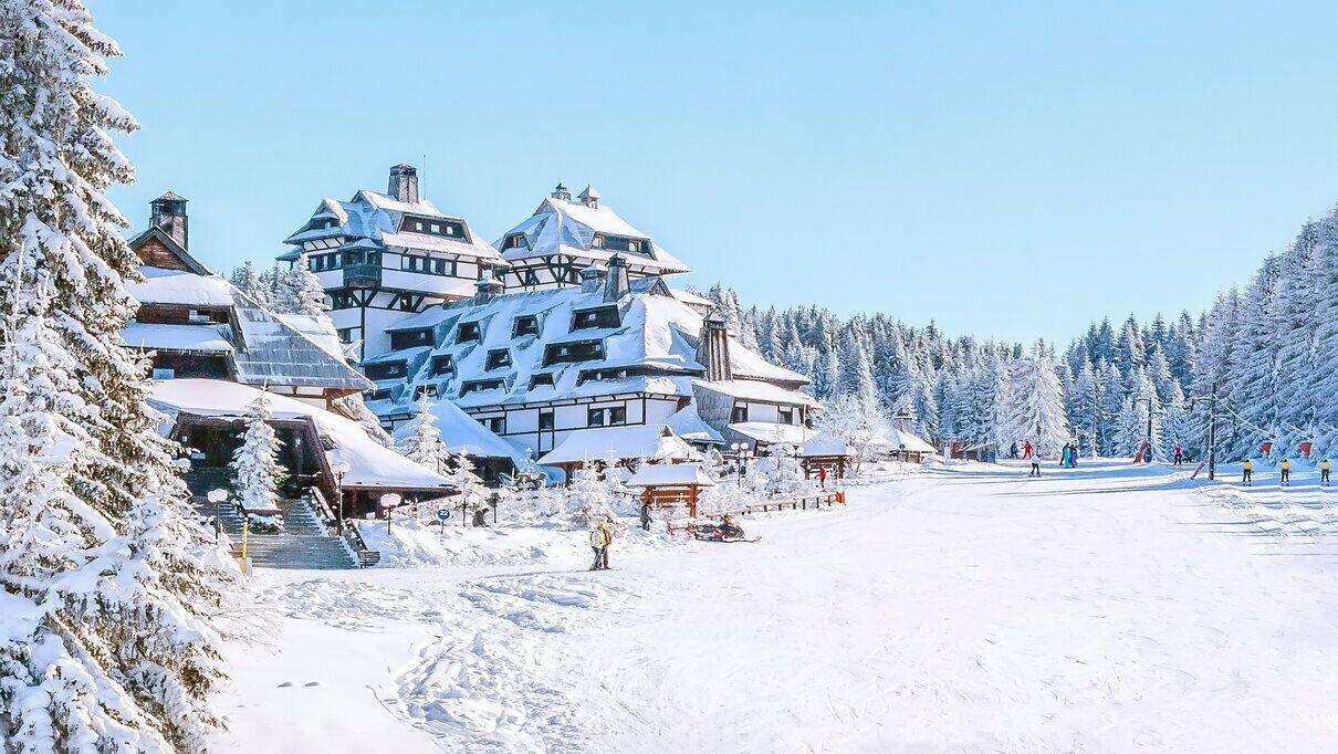Winter landscape of Kopaonik with hotels, ski slope, and snow in the center of the mountain resort