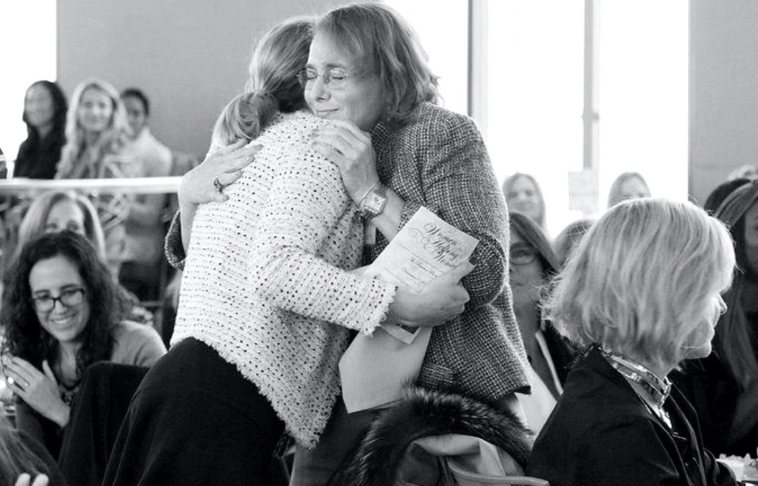 Two women hugging