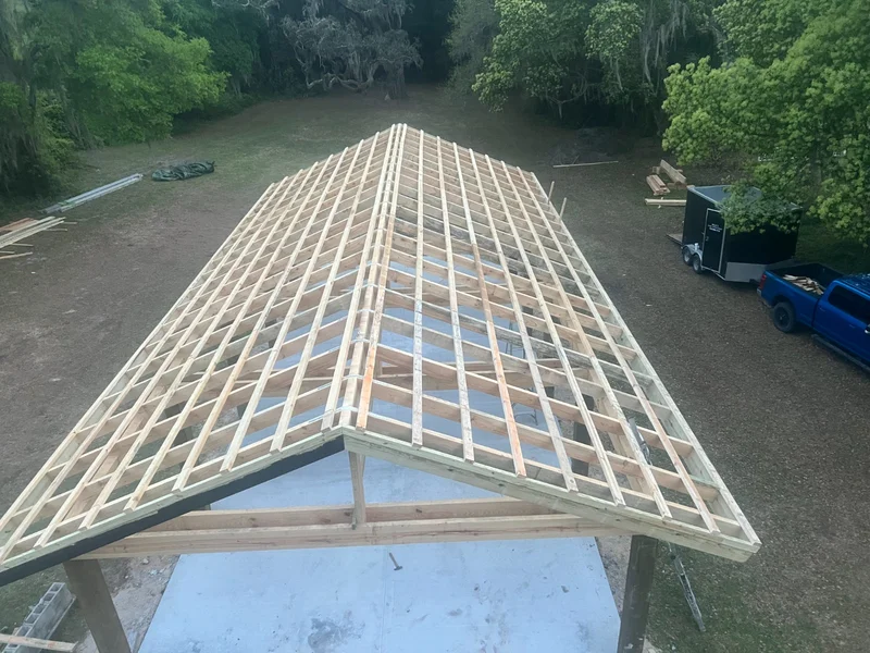 New gable roof structure with evenly spaced rafters