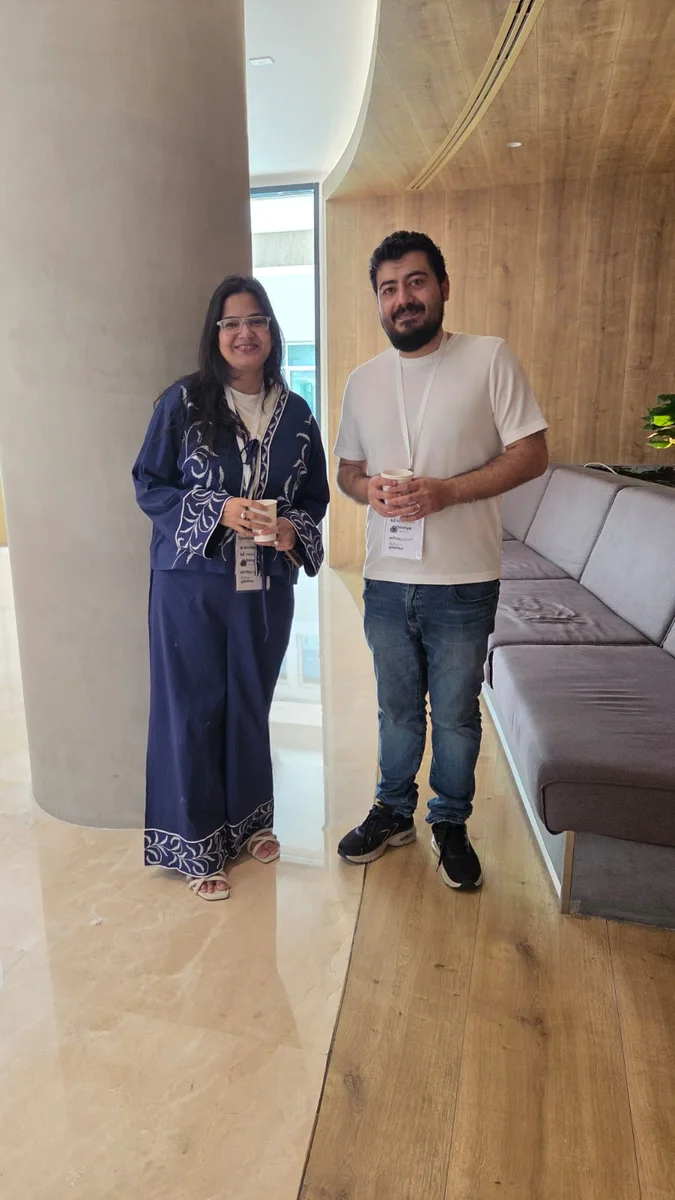 Conference session at VisiSummit Dubai with presentation screen