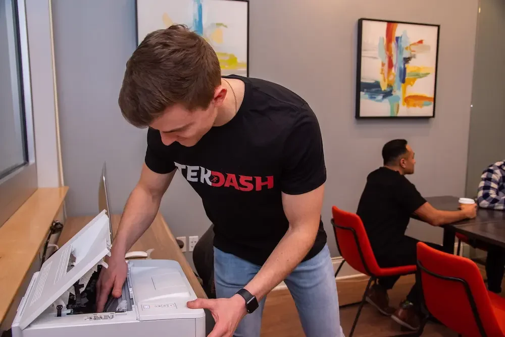 TekDash Tek setting up a new printer for a customer