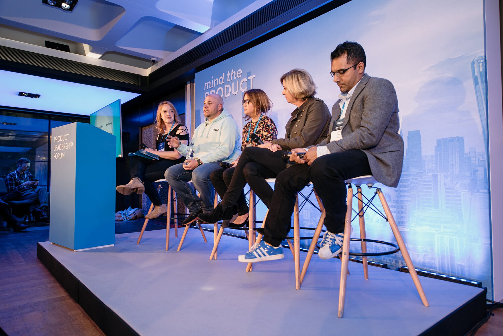 Emily Tate leads a panel at mtpcon Leadership forum