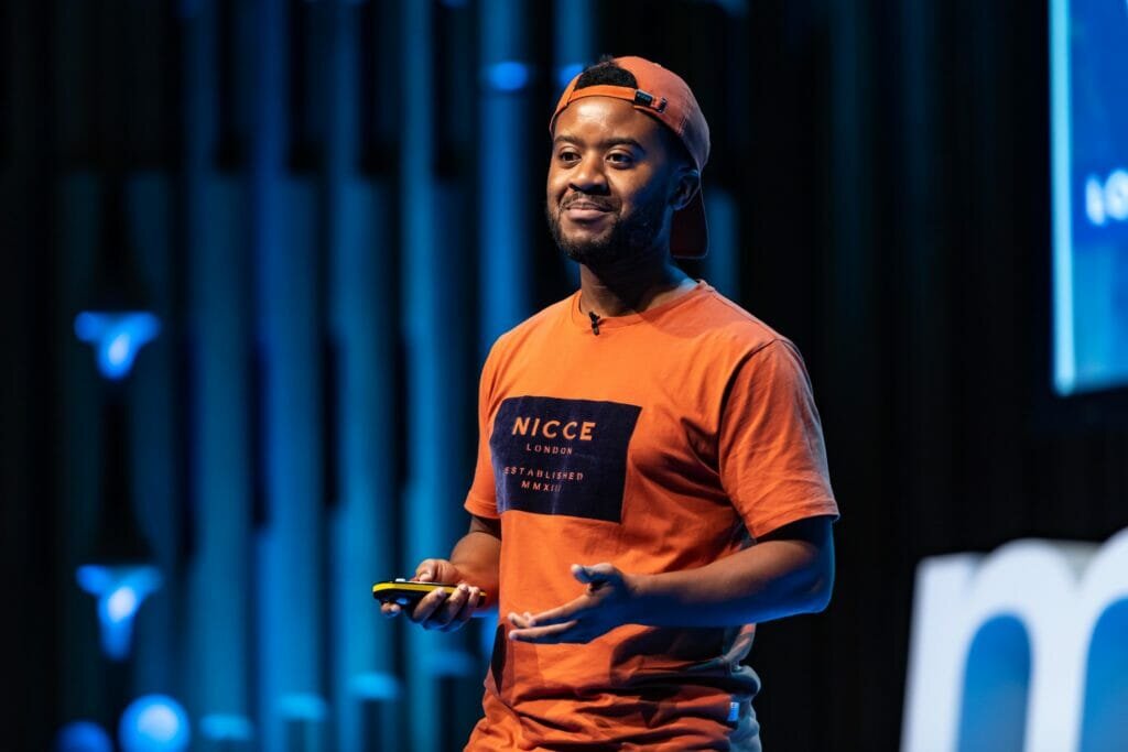 Andy Ayim speaking at Mind the Product London 2019
