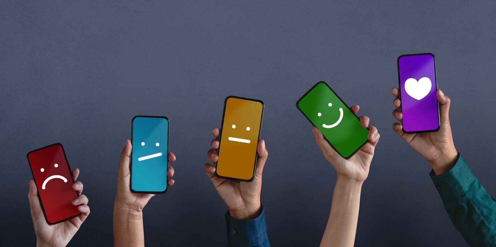 phone screens showing different smiley faces