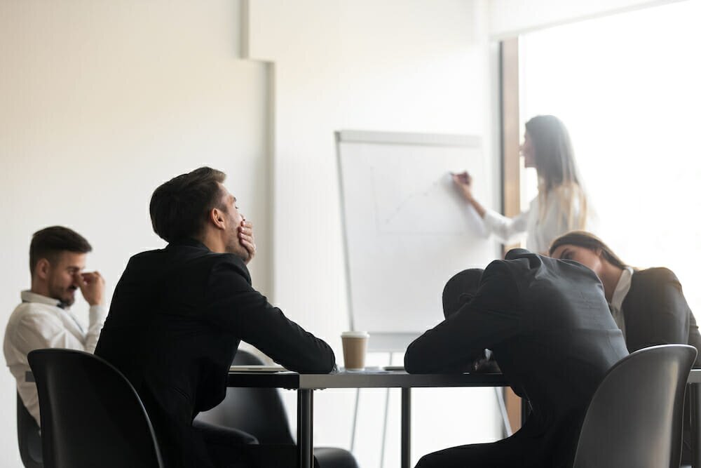 people looking bored in meetings