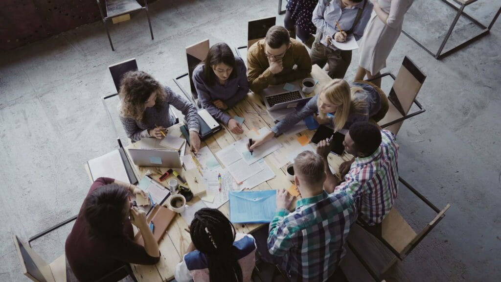 A team working around a large table