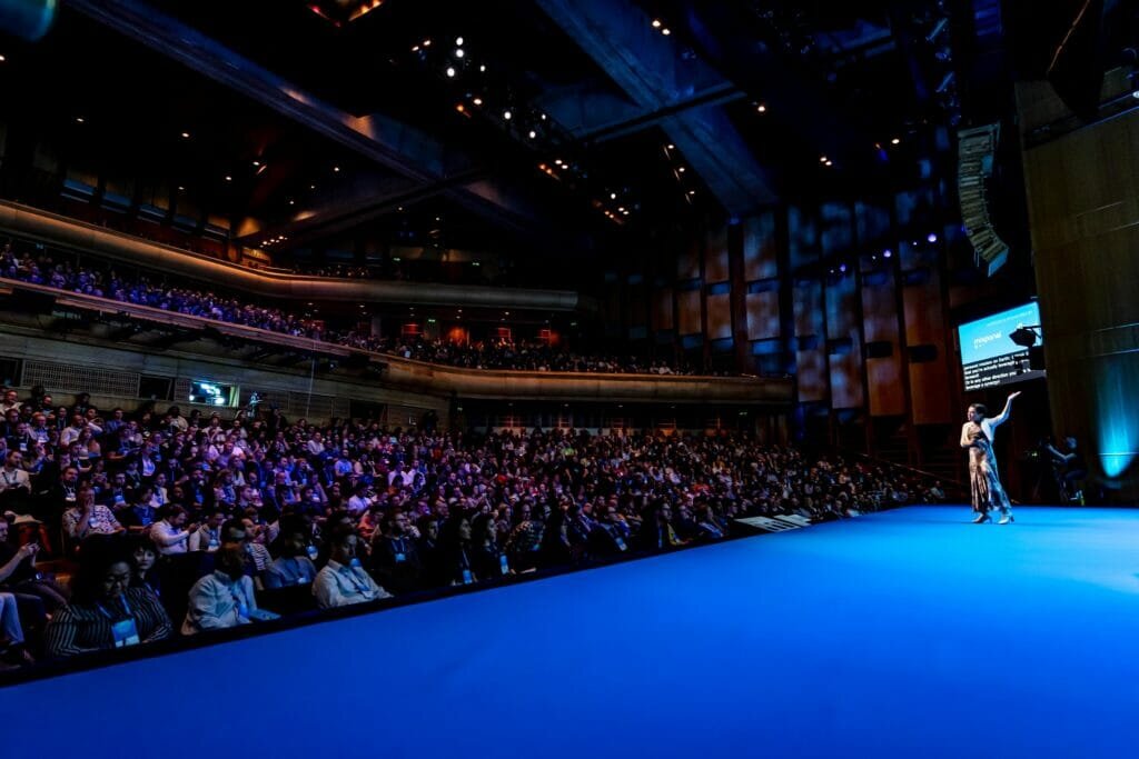 Lindsey Jayne speaking at Mind the Product London conference