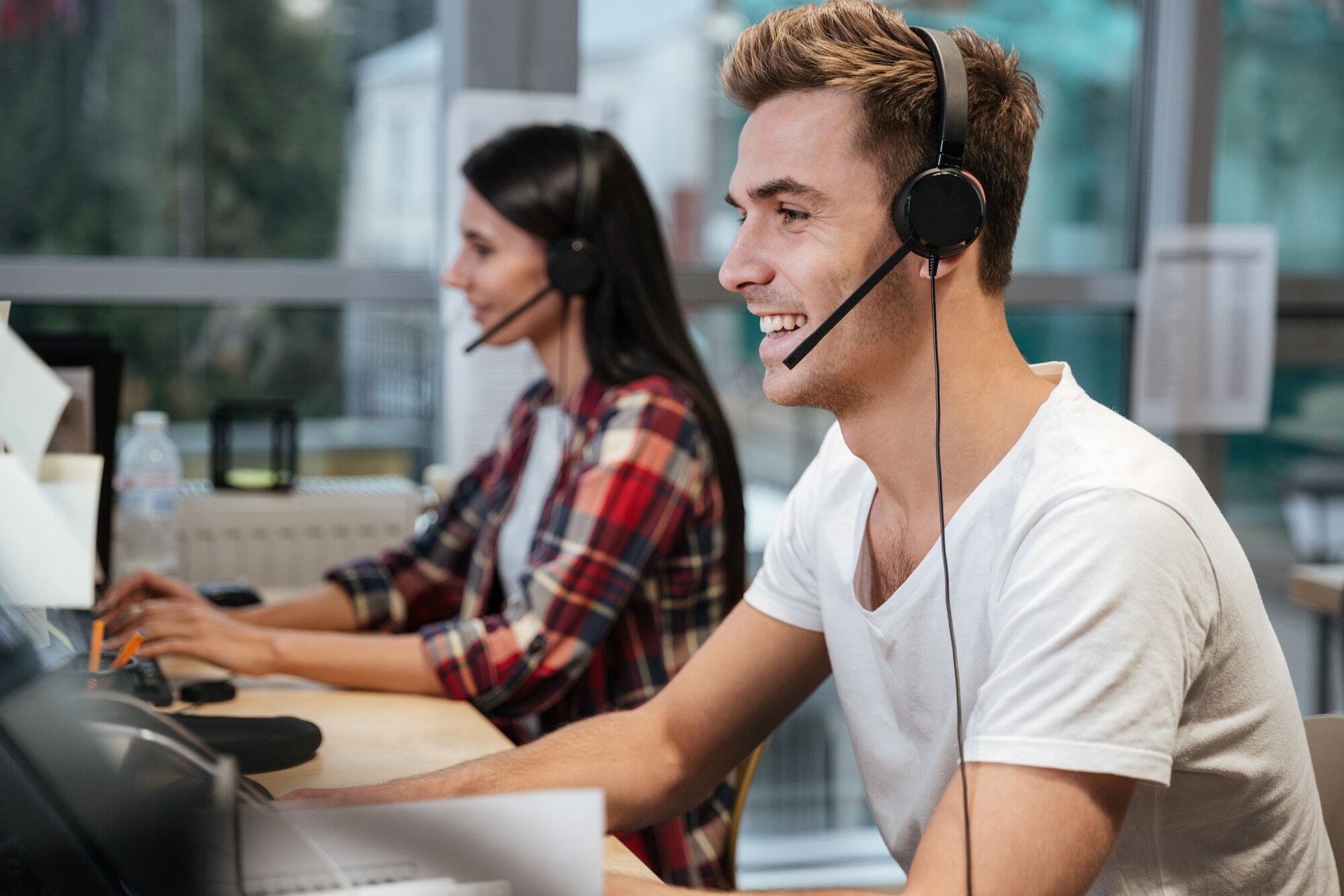 man and woman working in a call centre