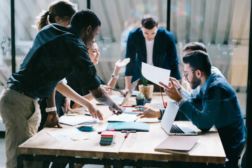A team working together at a long table