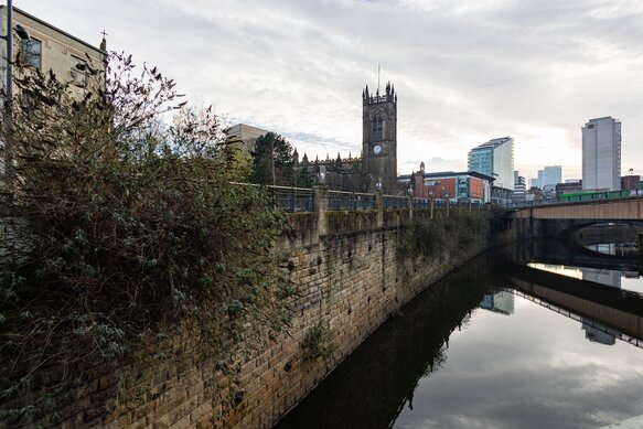 Bridge over river against sky