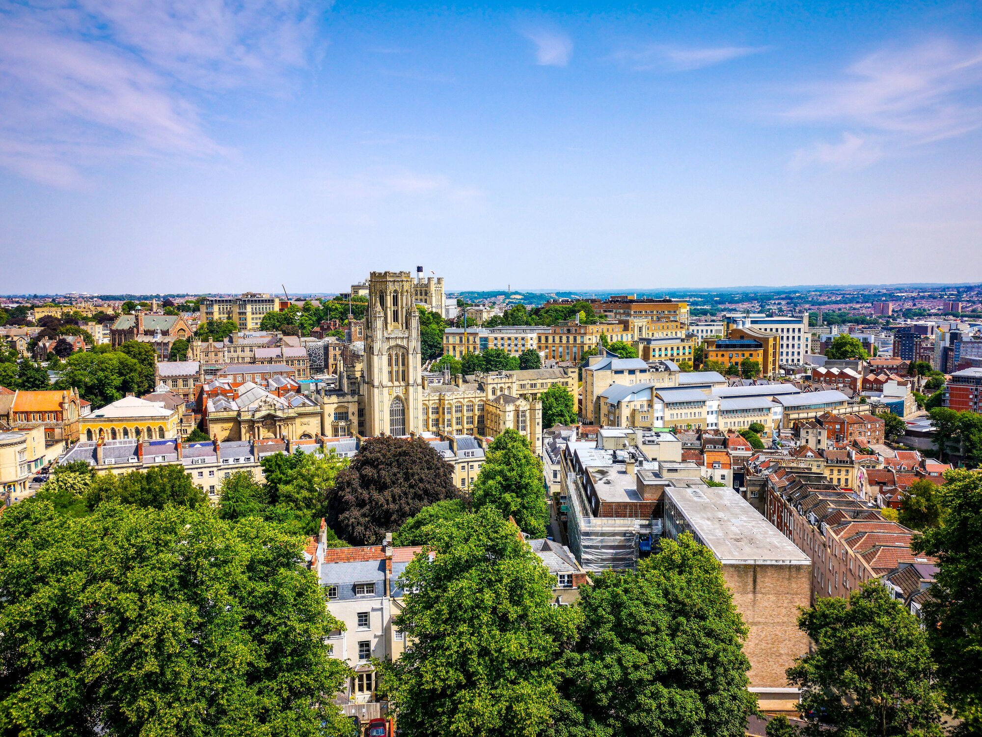 High angle view of buildings and trees against sky