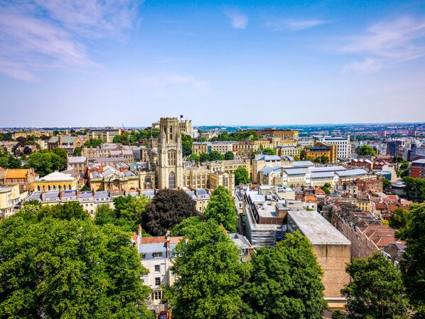 High angle view of buildings and trees against sky