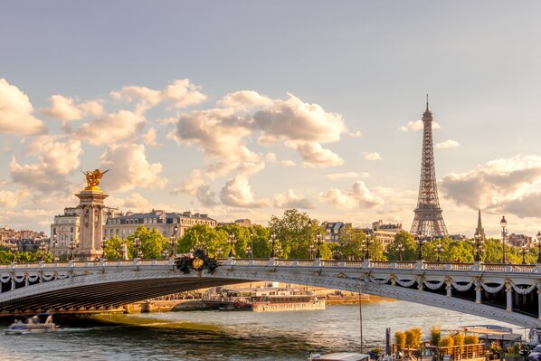 France. Sunny summer day in Paris. Alexander III Bridge and Eiffel Tower