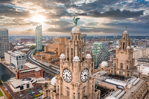 Aerial close up of the tower of the Royal Liver Building in Liverpool, UK during beautiful sunset.