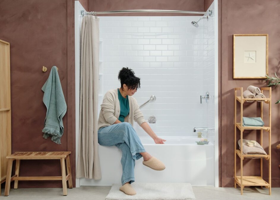 Woman sitting in bathroom beside tax season savings promotion