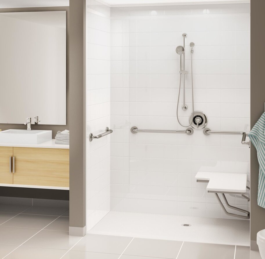 Bathroom with white tub and shower beside wood vanity