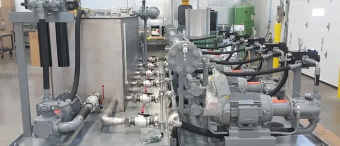 A large hydraulic power unit in a facility.