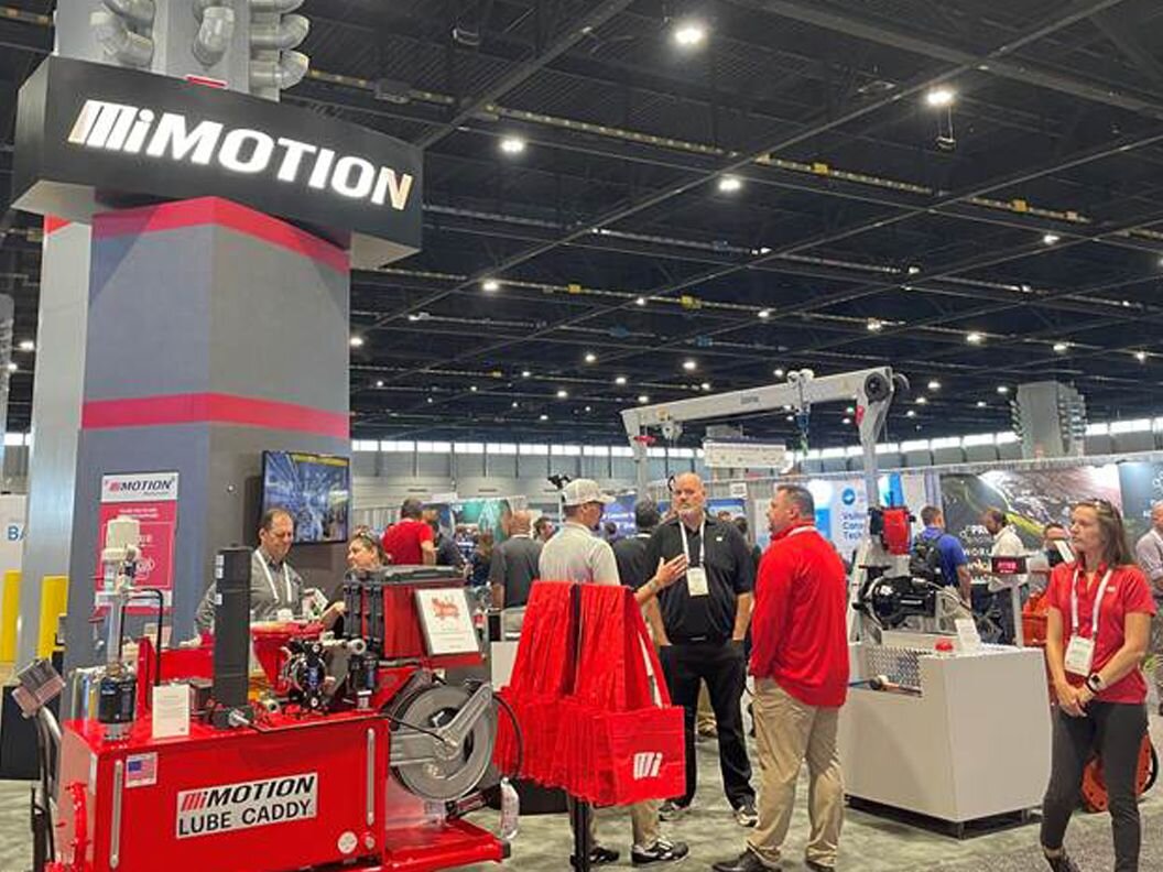 Motion at booth #604 at the GEAPS Exchange, interacting with patrons.