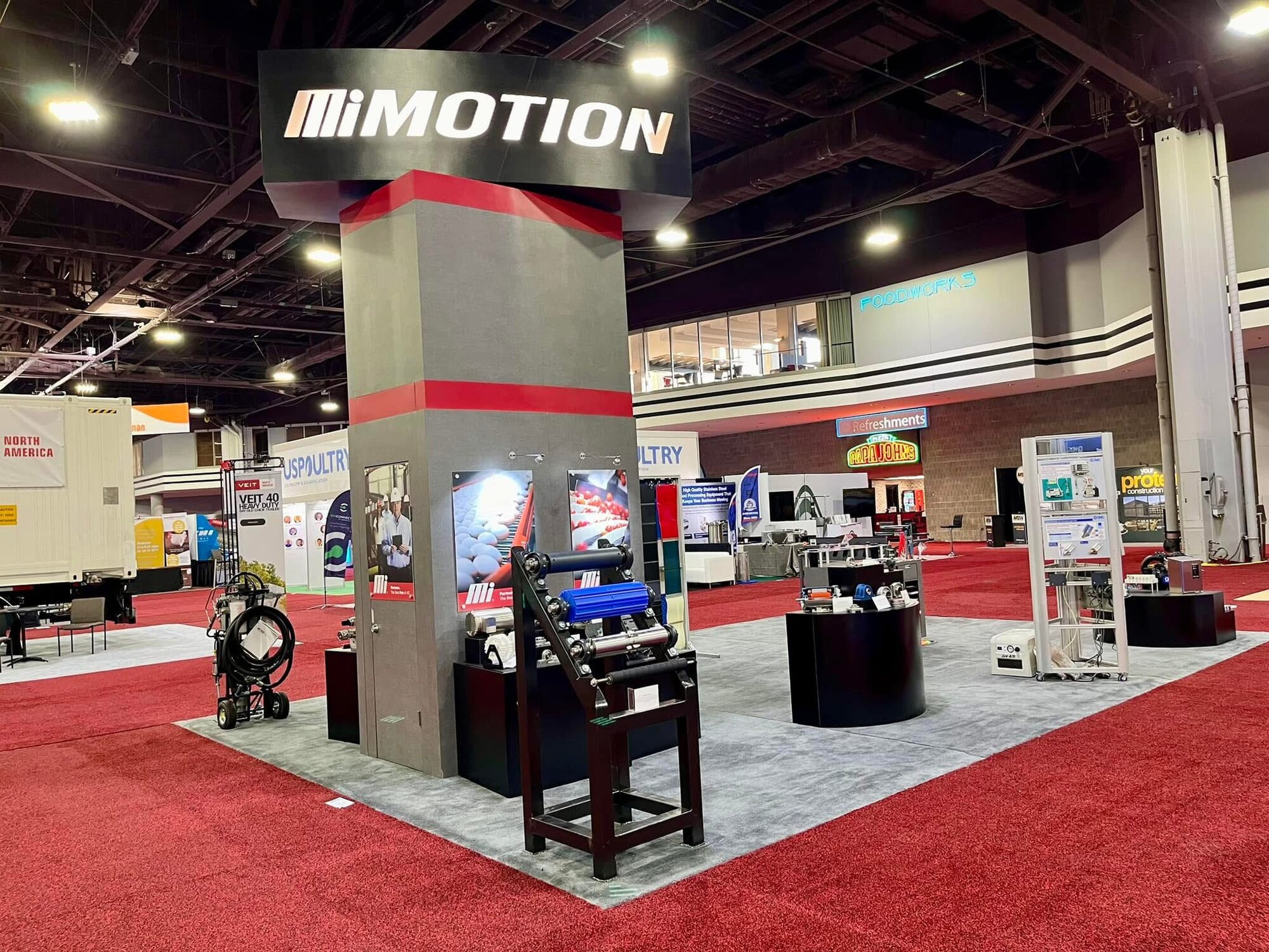 Motion's booth located at IPPE, displaying reading materials.