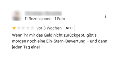 Screenshot einer Rachebewertung und Androhung auf Google.