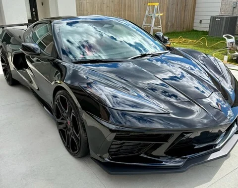 Sleek black Chevrolet Corvette sports car with show-ready finish