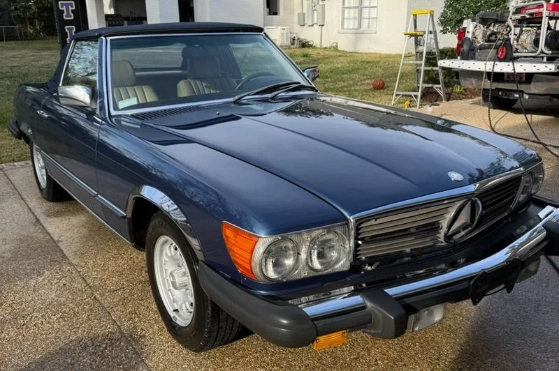 Vintage blue Mercedes classic convertible with showroom-quality detailing finish