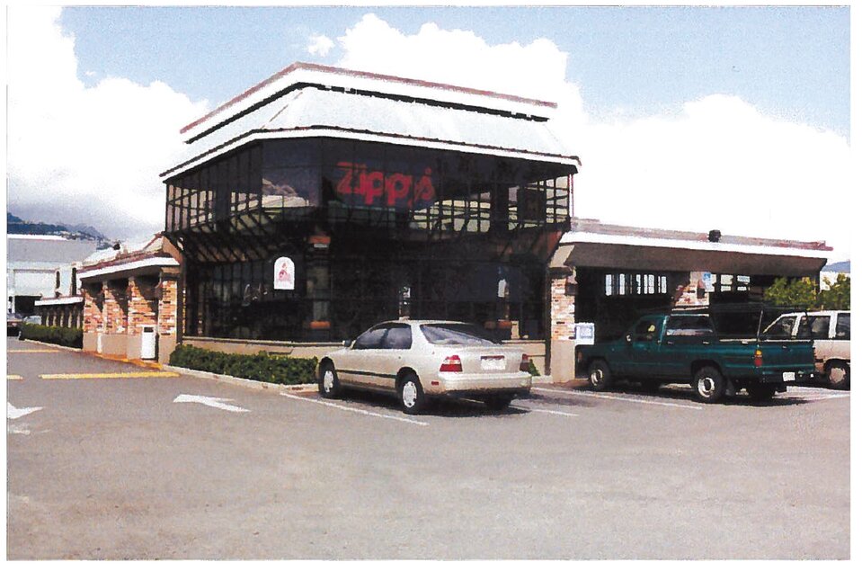 Zippy's Dillingham with its glass walls and white roof