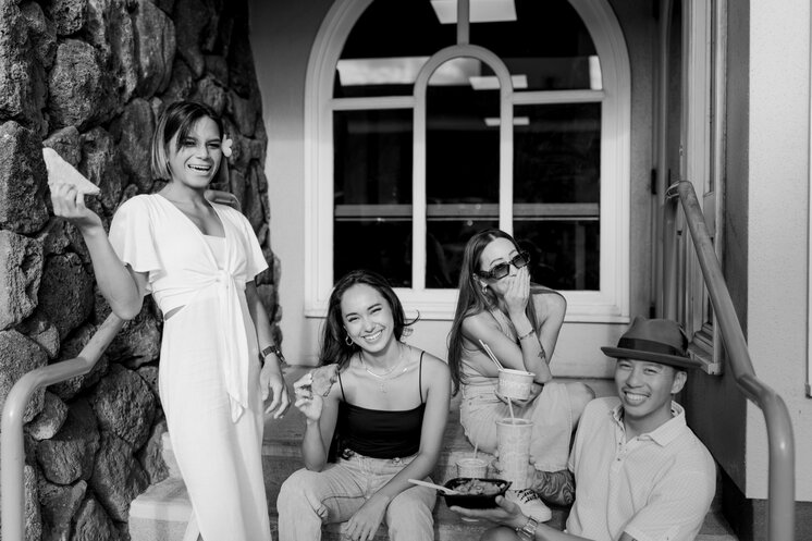 Four friends sitting together with Zippy’s drinks