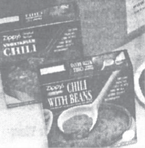 Newspaper photo of Zippy's Vegetarian Chili and Chili with Beans boxes