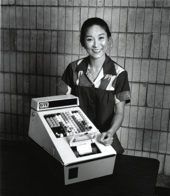 A Zippy's employee at the cash register in the 1970s