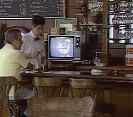 A bartender and a customer at Charlie's Bar in Zippy's Wahiawa